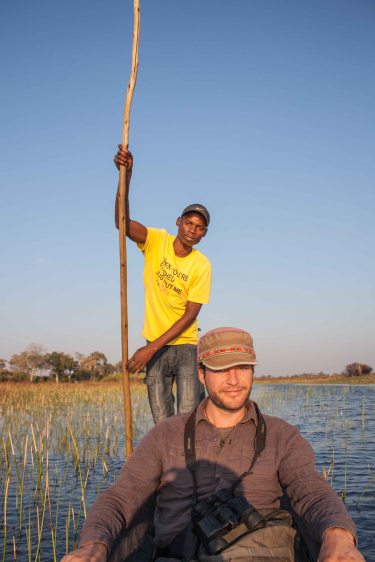 Chris and our mokoro guide, Twist, on the Okavango Delta